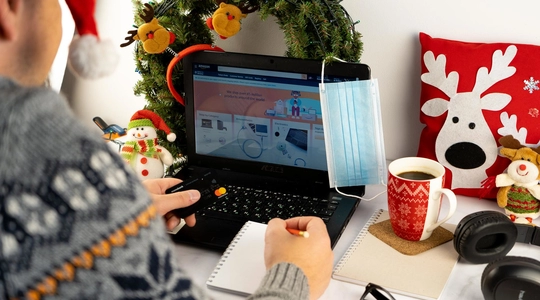 Person in front of laptop shopping online