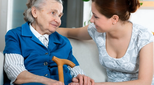 senior woman with her home caregiver