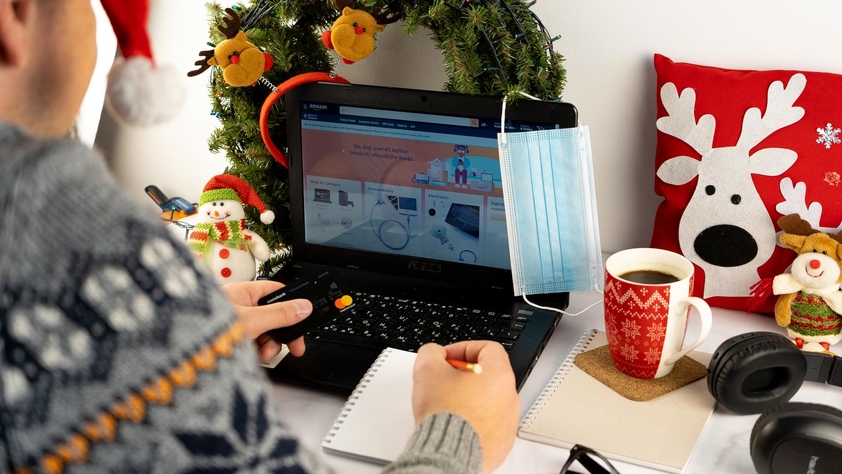 Person in front of laptop shopping online