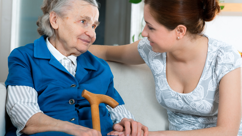 senior woman with her home caregiver
